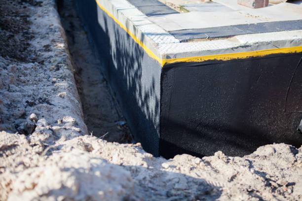 Professional Waterproofing technician working in Coloma, MI